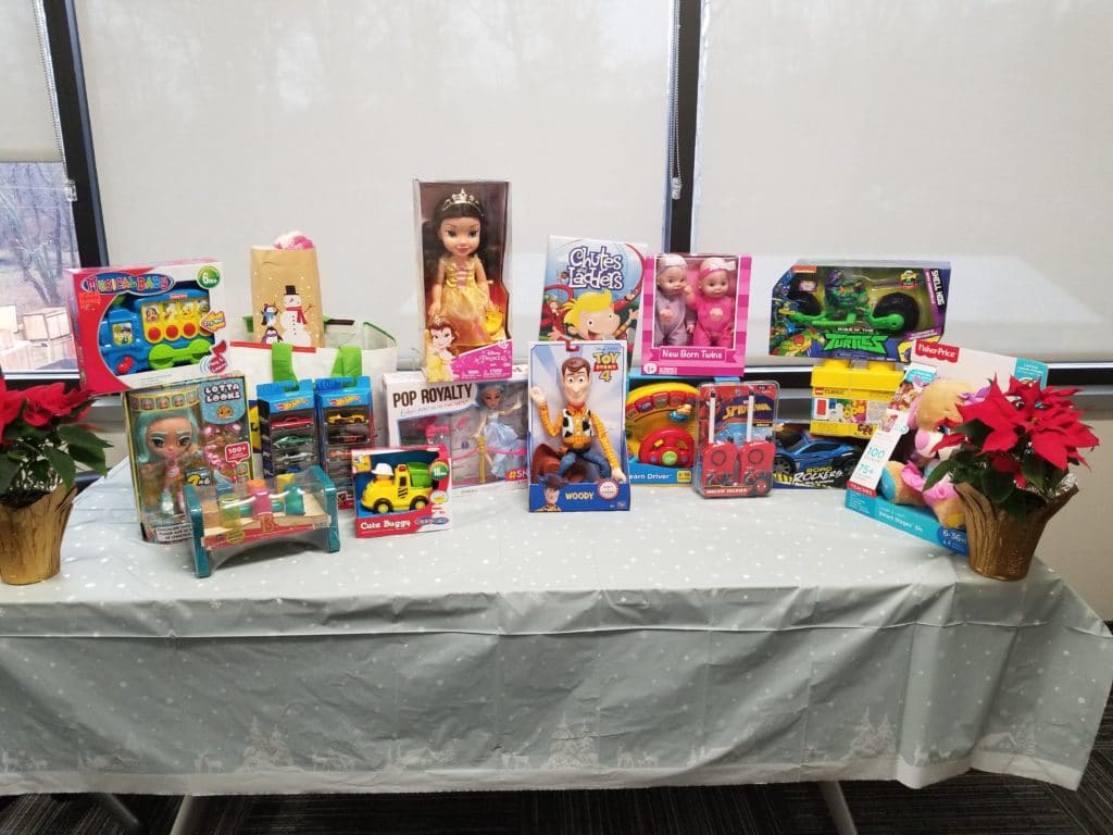 Donated children's toys are assembled on a table 
