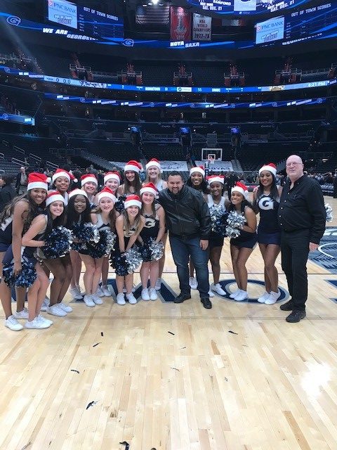 Hilldrup took a photo with the Georgetown cheerleading team on the court after the game. 