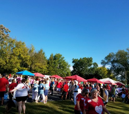 Fredericksburg Heart Association walk with tents, walkers, supporters gathered around