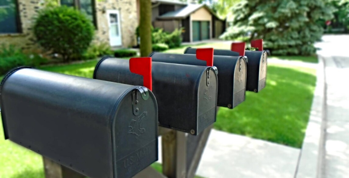 Picture of mailboxes with their flags up.