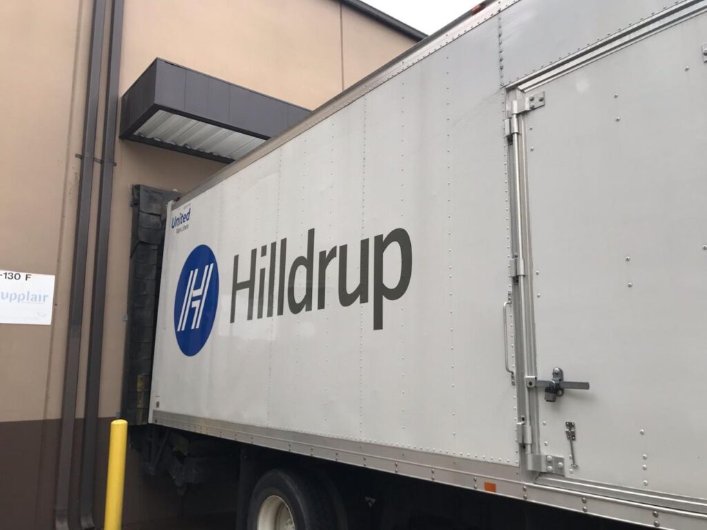 Hilldrup truck unloading food donations at a school in Georgia. 