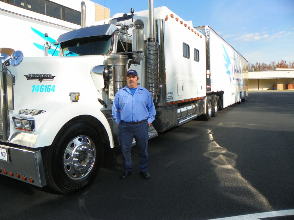 Dennis Putnam stands outside his truck at Stafford's Corporate Headquarters in Stafford, VA.