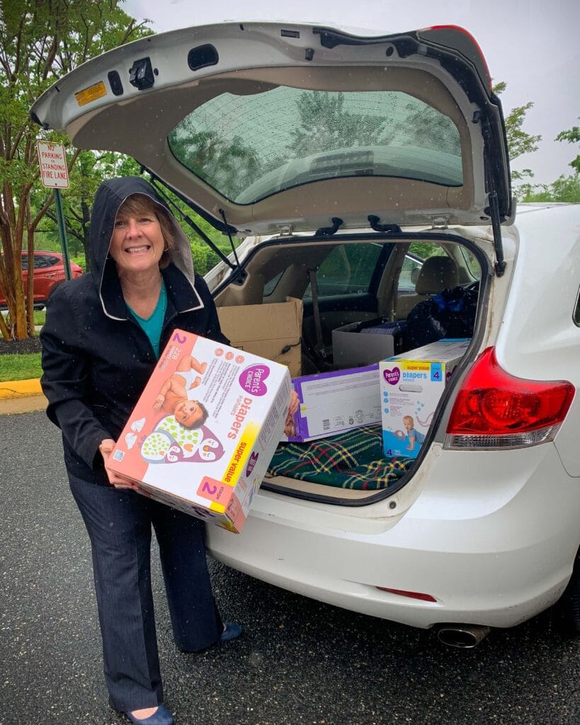 Mary Katherine Wood delivers diapers to Empowerhouse in Fredericksburg. 