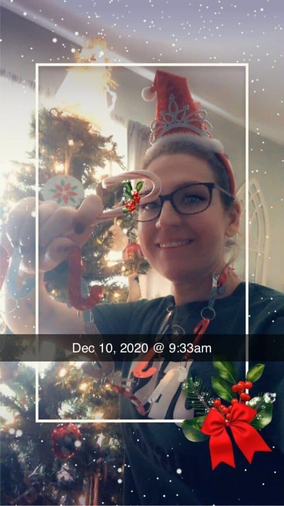 Jessica Facciolo takes a selfie with her Christmas tree for a festive virtual game. 