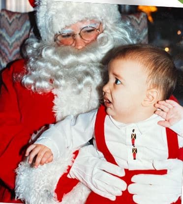 Hilldrup's Director, Logistics Services as a child with Santa. 