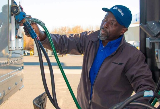 Hilldrup Van Operator, Olu Osinowo prepares his truck for a move.