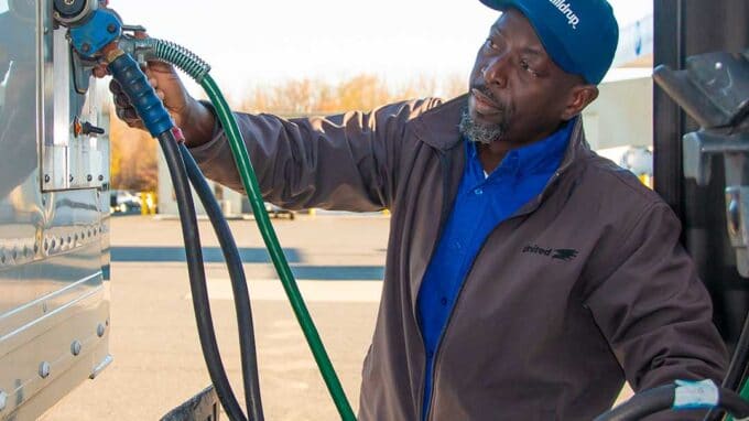 Hilldrup Van Operator, Olu Osinowo prepares his truck for a move.