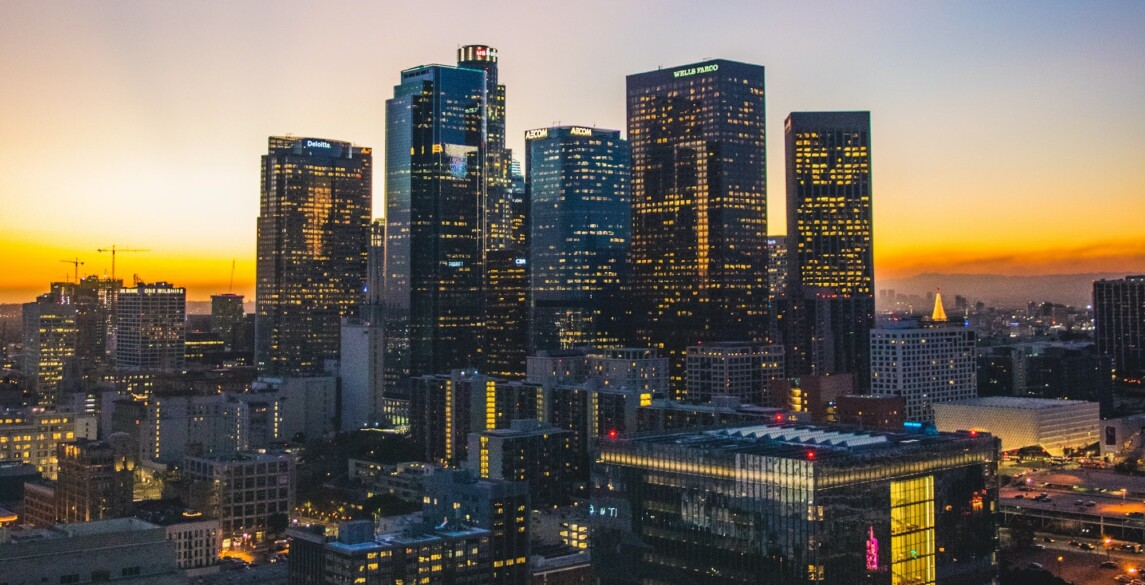 Picture of a city skyline at sunset.