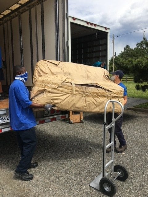 Hilldrup Richmond loads a donated couch to our trucks.