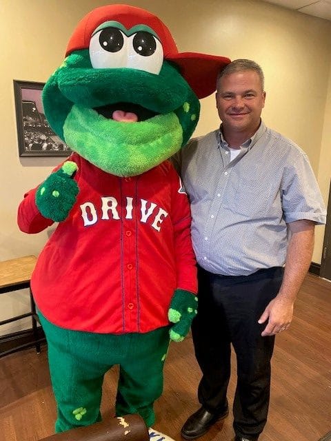 Billy Morrison and Greenville Drive's mascot. 