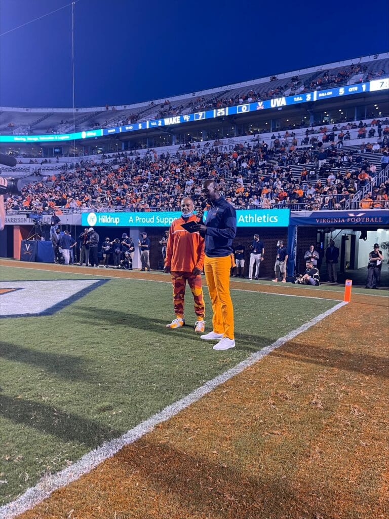 Hilldrup's Chris Nelson prepares to get the UVA crowd ready for trivia during the game. 