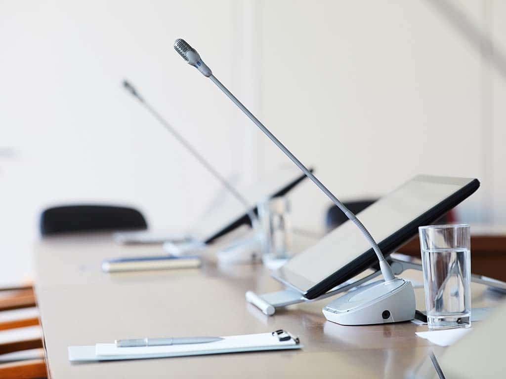 Microphones at conference table