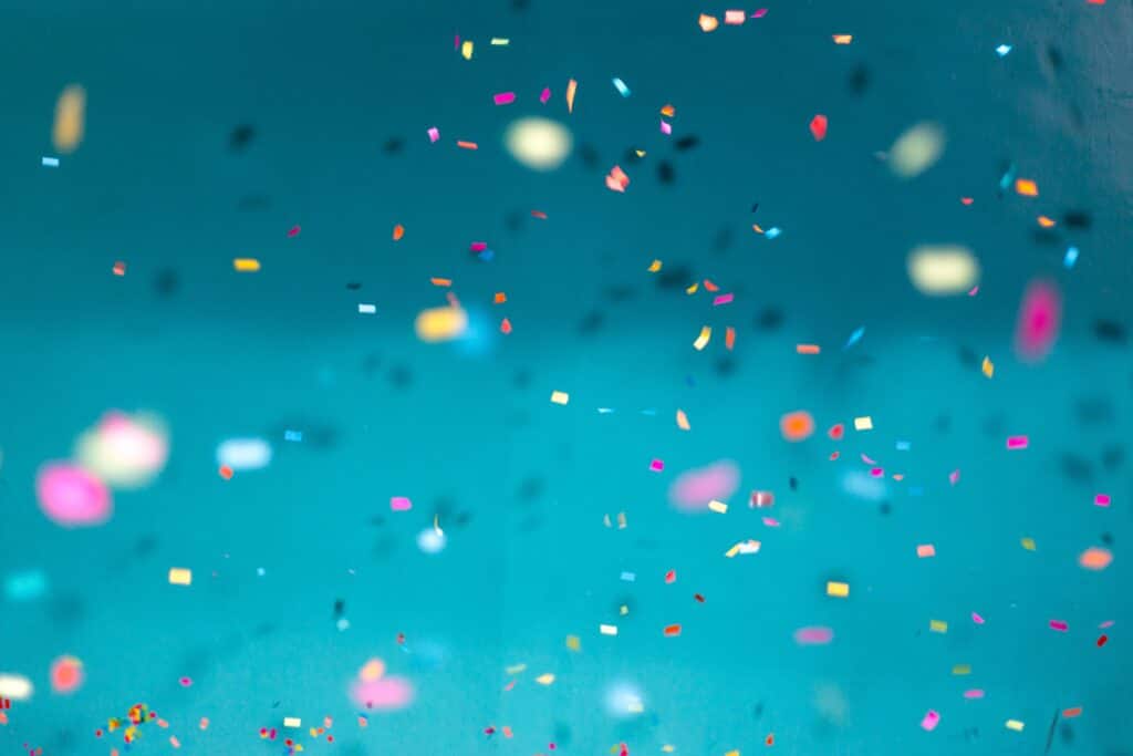 Confetti against blue background.
