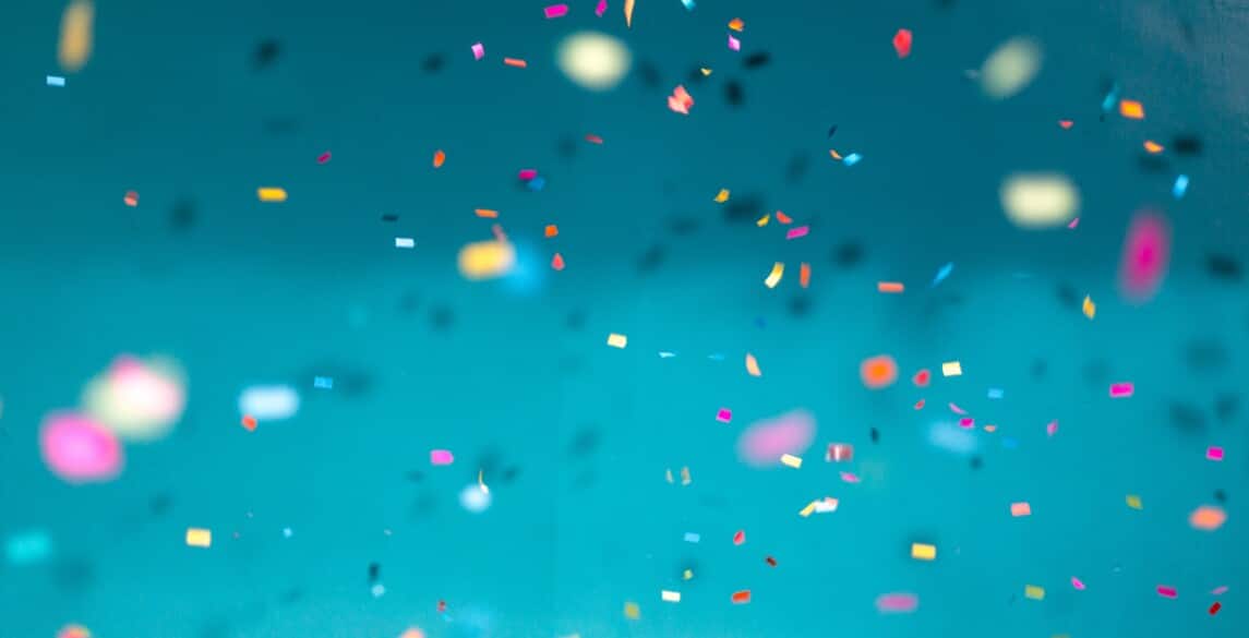 Confetti against blue background.