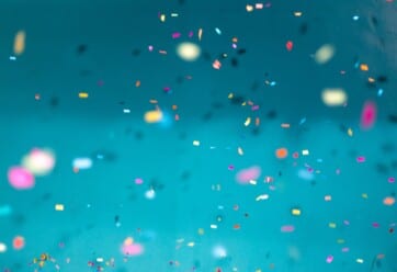 Confetti against blue background.