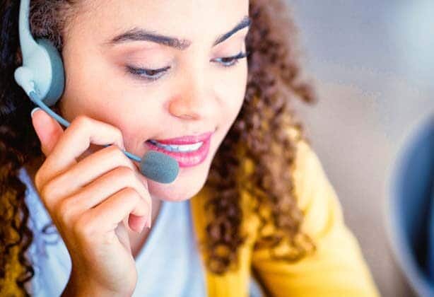 woman speaking into headset