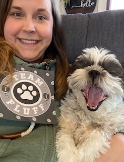 headshot of woman and her dog