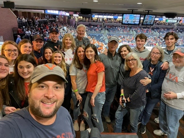 Group of people in basketball arena