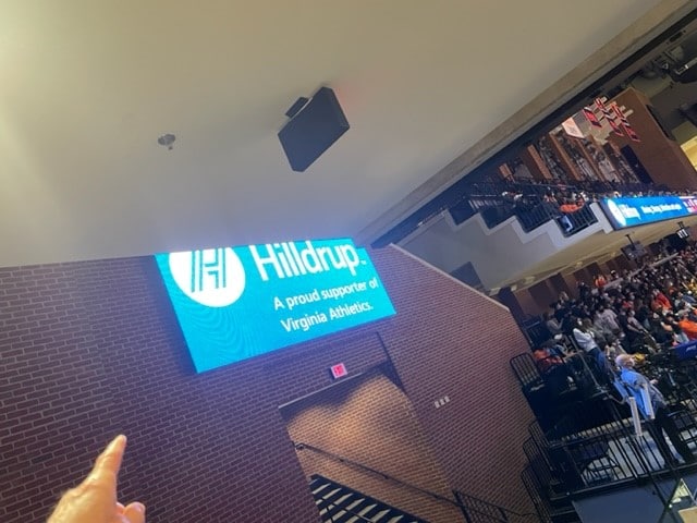 Hilldrup branded signage at basketball arena