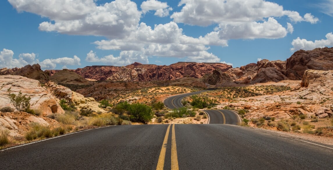 Picture of open road in desert.
