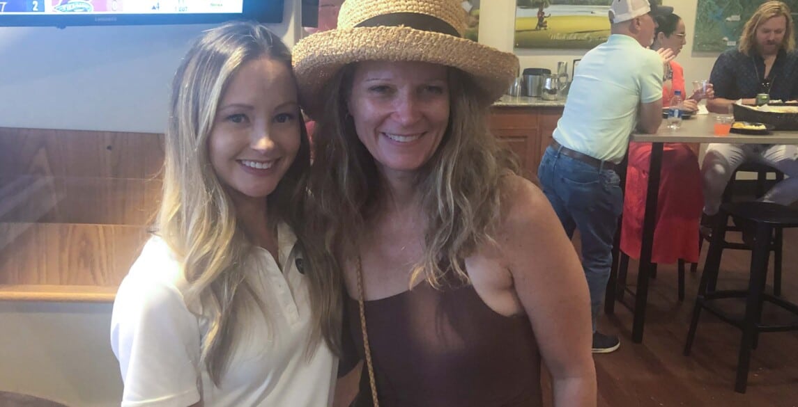 Molly Vickery with guest at Greenville Drive game