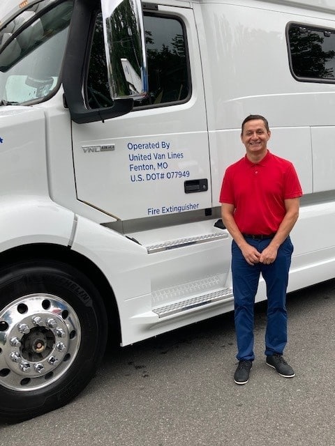 Jose Espinal, Van Operator, by his truck.