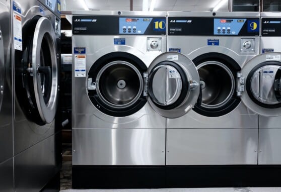 Washing machines on display in a store.