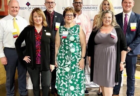 Remus with colleagues at the Fredericksburg Chamber of Commerce's Distill It event