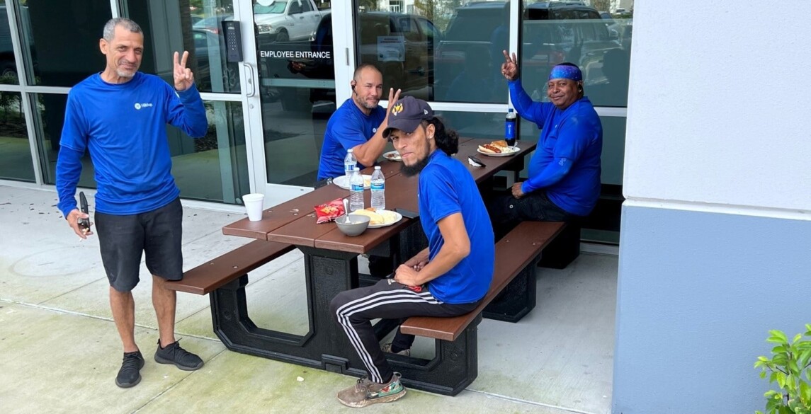 Warehouse teams enjoying lunch outside