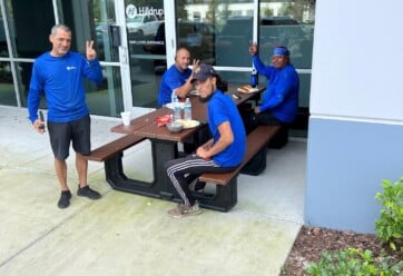 Warehouse teams enjoying lunch outside