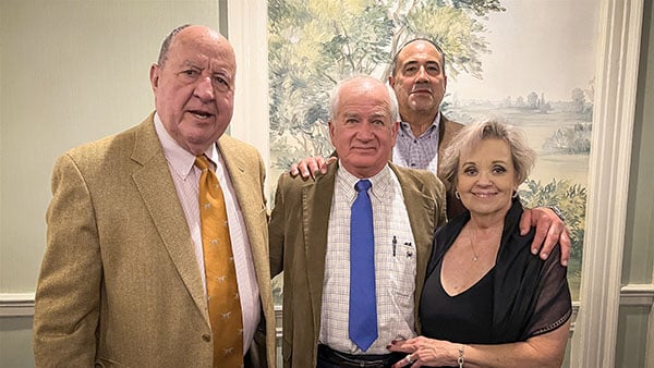 Mr. McDaniel and Charles W. McDaniel with E.J. Radford and his wife.