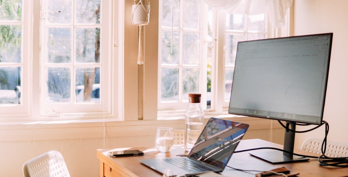 Home office set-up with two monitors.