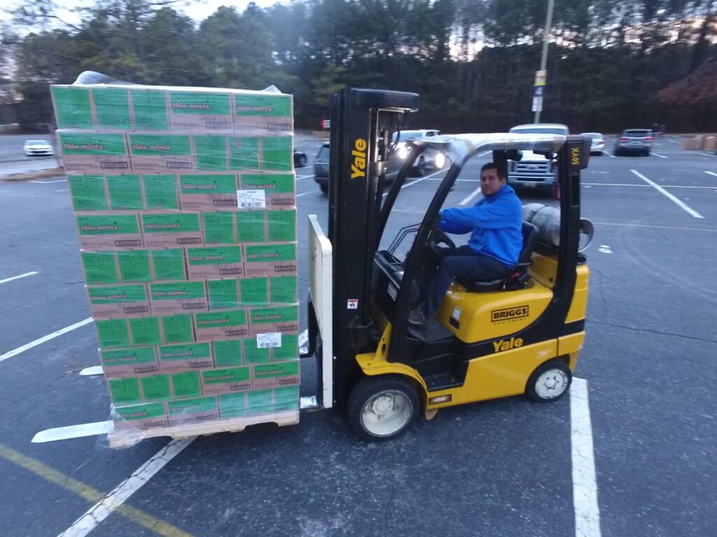 Hilldrup Atlanta Forklift Operator at Girl Scout cookie distribution event. 