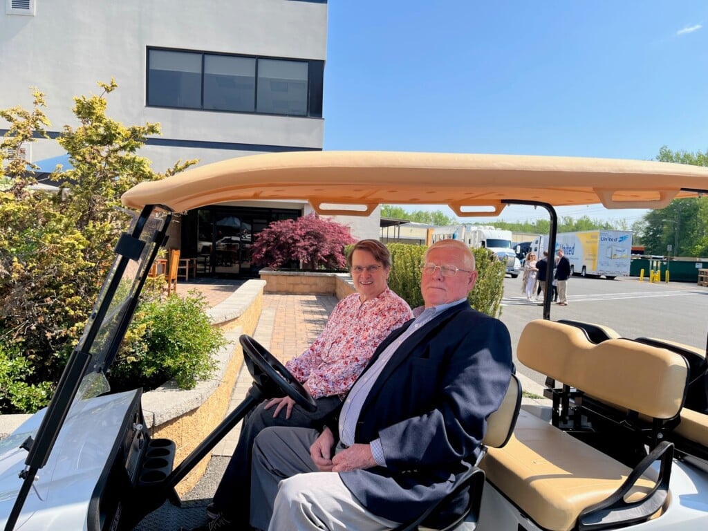 Dick Carmichael with visitors from Marriott outside Corporate Headquarters. 