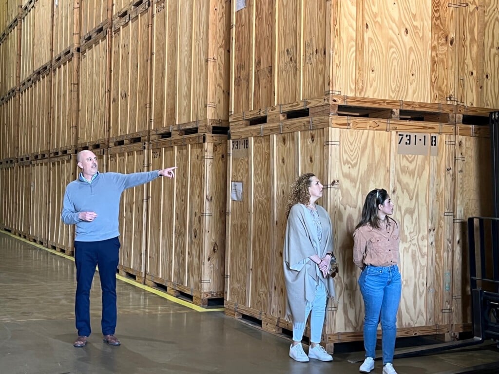 John Seal provides tour to Marriott in warehouse 