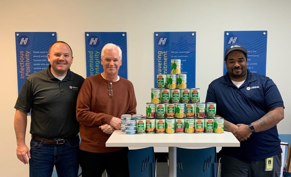 Capitol Heights team with their canned donations. 