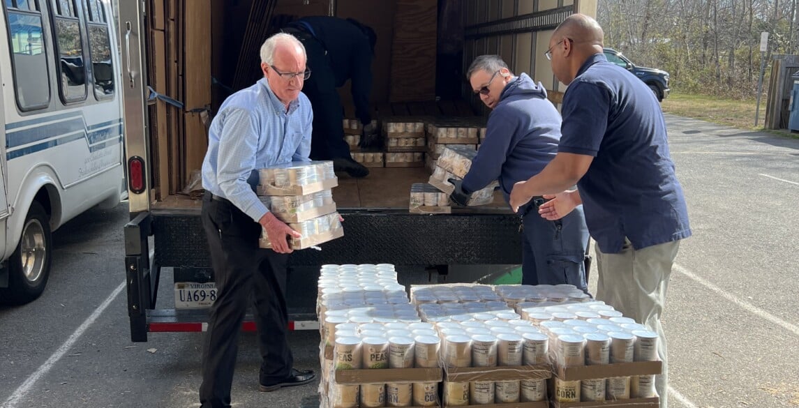 Stafford unloading canned food donations