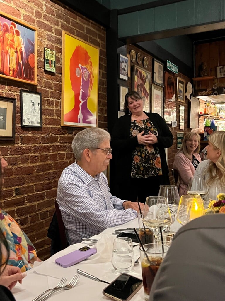 Michele House gives speech during retirement dinner for Joyce Lopez. 