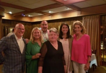 Brenda Harless with Jimmy, Onie and the McDaniel family at her retirement dinner.