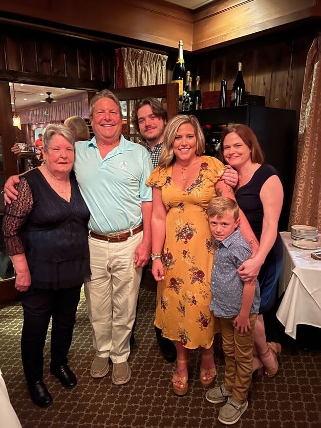 Brenda Harless and her family during her retirement dinner party. 