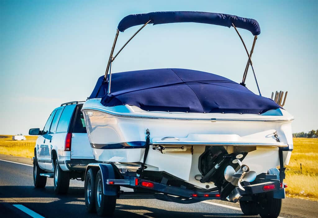 Car towing a boat