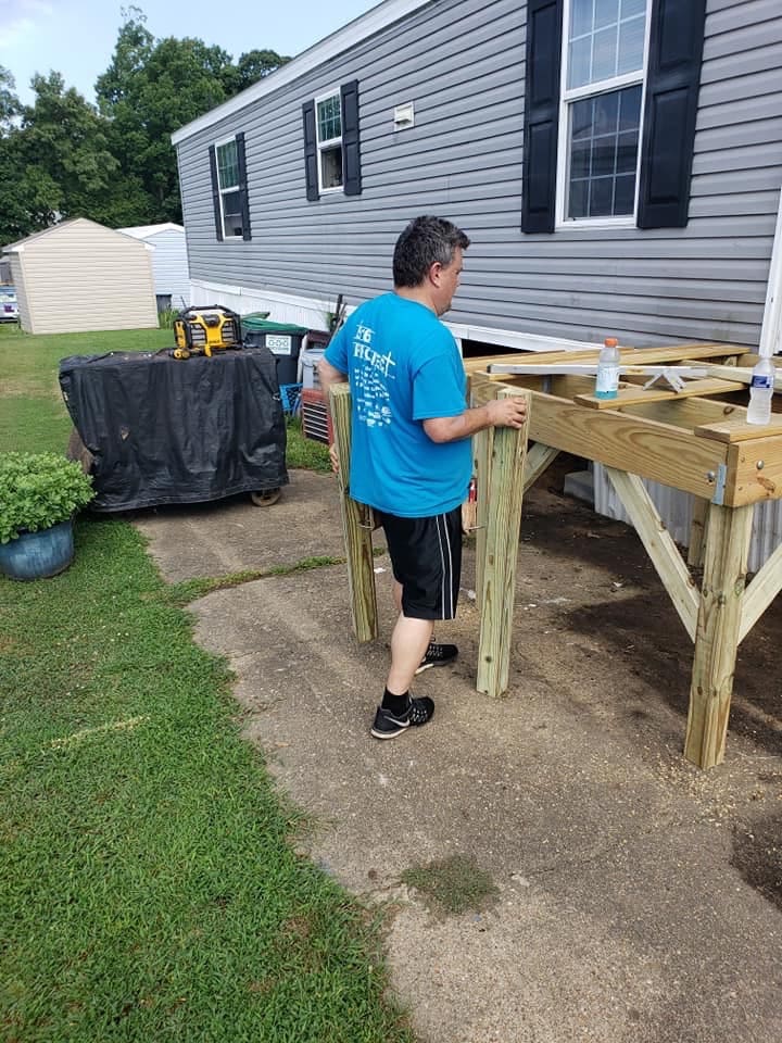 A volunteer with the 516 Project assists with a home upgrade project. 