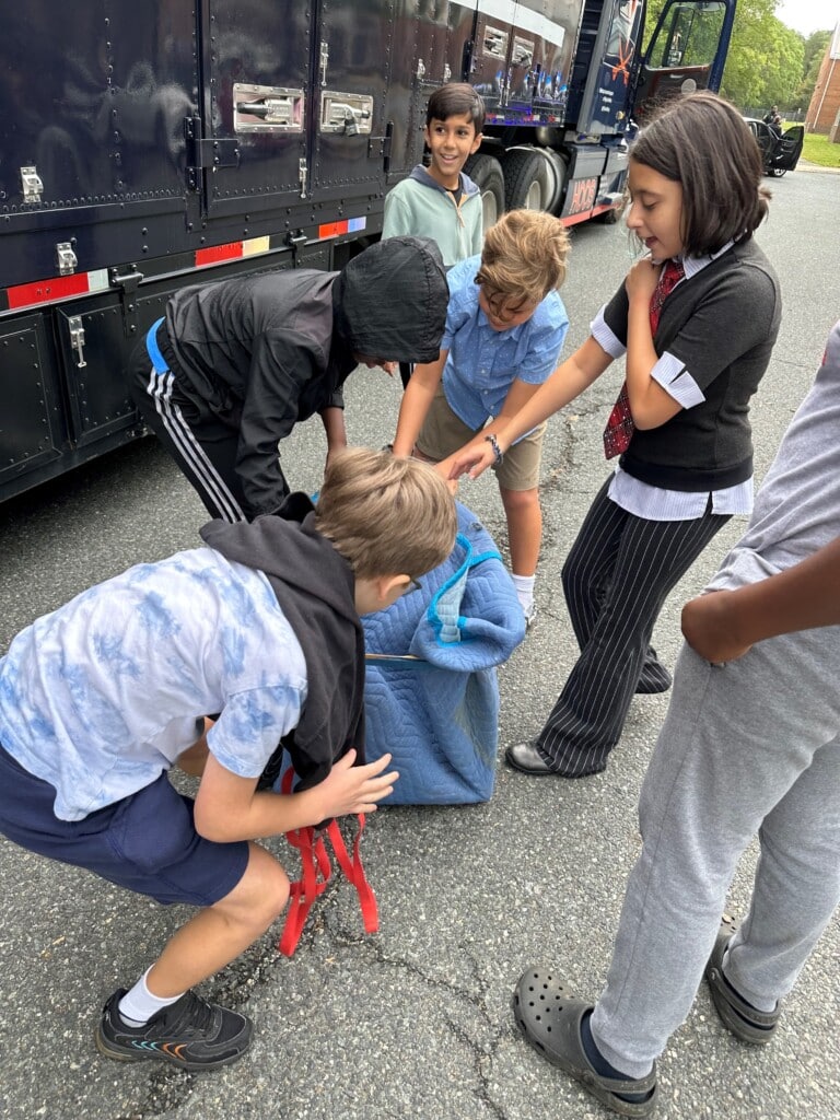 Lafayette students learn to pack an item during Careers on the Move Day. 