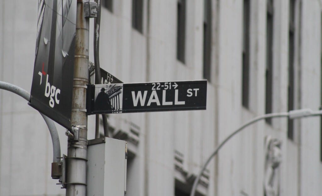 Picture of a street sign in New York for Wall Street.