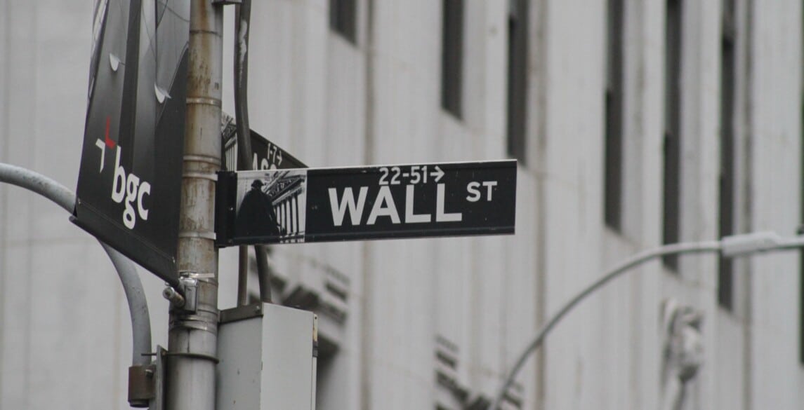 Picture of a street sign in New York for Wall Street.
