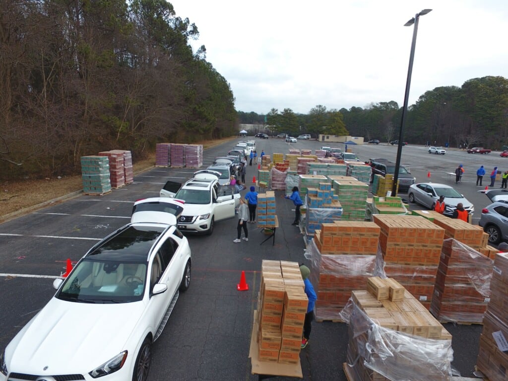 Personal vehicles at the Six Flags White Water during Hilldrup Atlanta's Girl Scout cookie drive. 