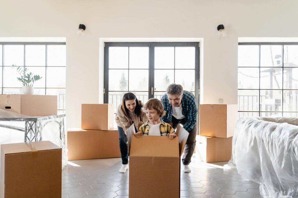 family with moving boxes