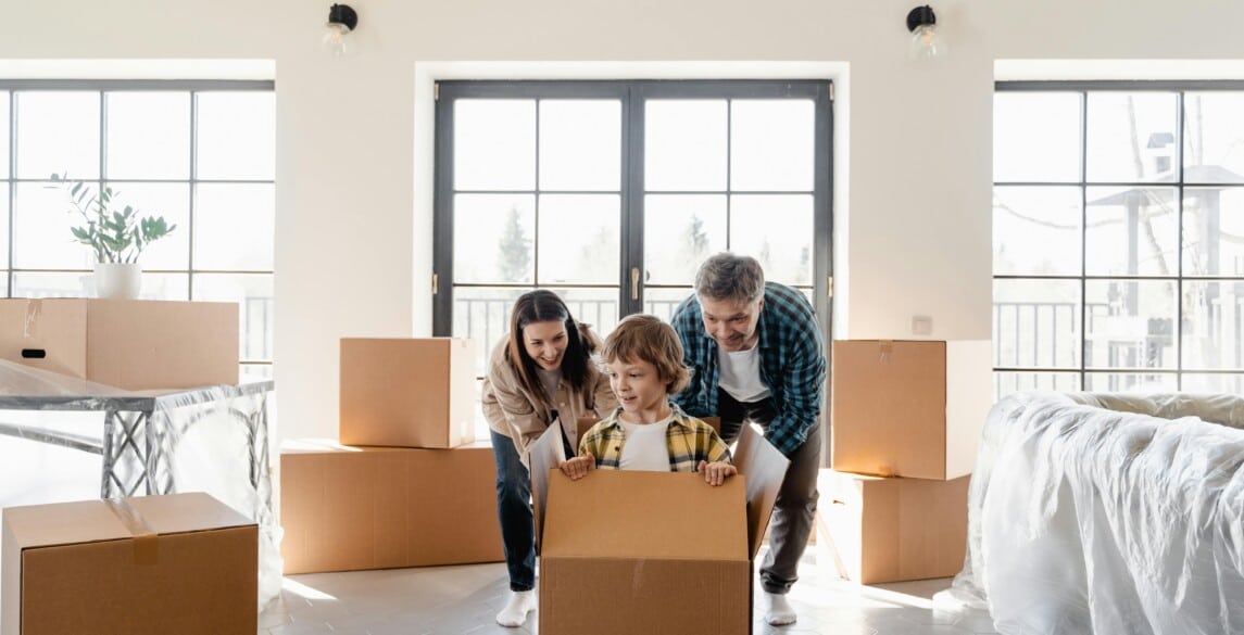 family with moving boxes