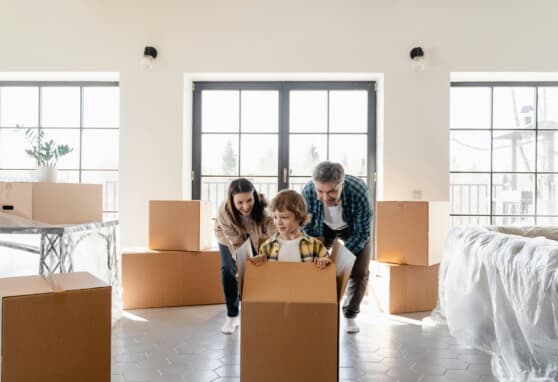 family with moving boxes