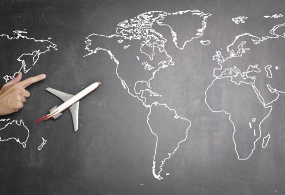 world map with plane heading to a new country